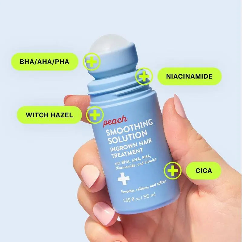 Hand holding a blue skincare treatment bottle with labeled ingredients on a light blue background