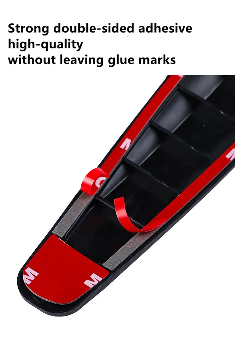 Close-up of self-adhesive bumper guard with red backing being peeled.
