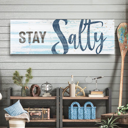 Stay Salty Blue Script on Blue Stripes Coastal canvas shown in a styled room setting, view 2