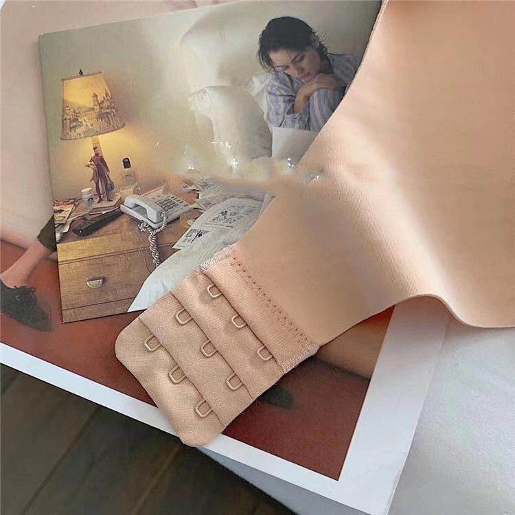 Beige shapewear on a magazine with a blurred background