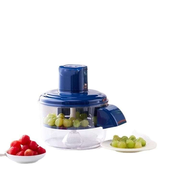 Blue electric peeler with grapes and cherry tomatoes on a white background