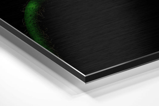 Wilting olive flower brushed aluminum panel corner close-up showing the brushed metal grain