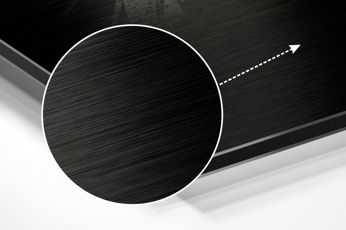 Magnified detail of the brushed metal grain showing through the eagle head in sharp shards print