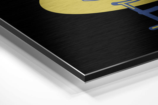 Blue cake slice brushed aluminum panel corner close-up showing the brushed metal grain
