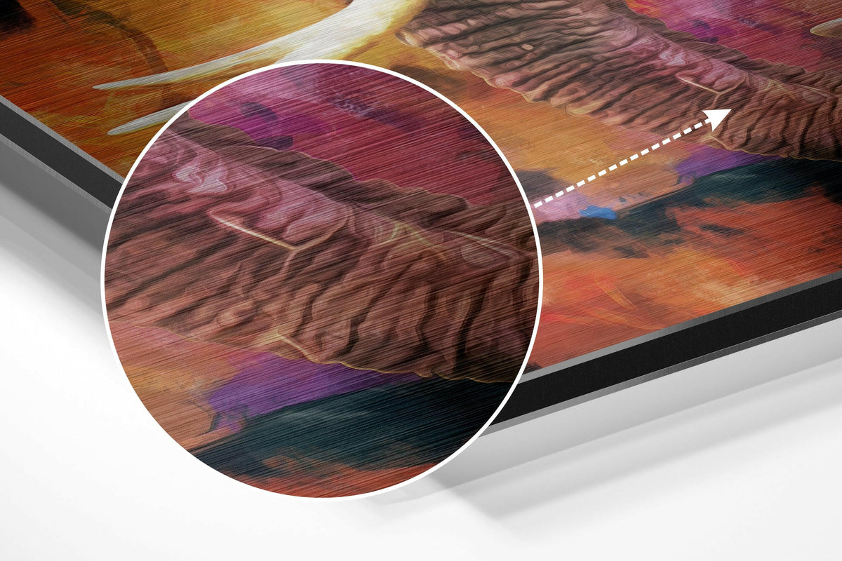 Magnified detail of the brushed metal grain showing through the colorful splash elephant print