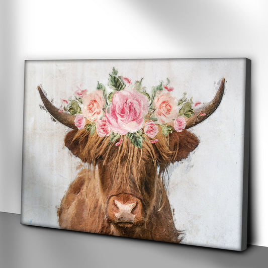 Highland cow with flower crown canvas shown at an angle on a gray wall
