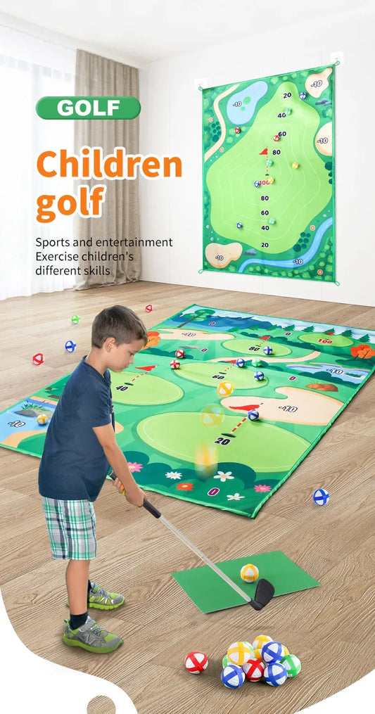 Child playing with a golf set on a large green mat resembling a golf course.