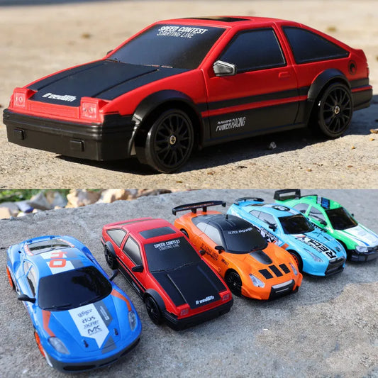 Collection of colorful rc toy cars on a textured surface