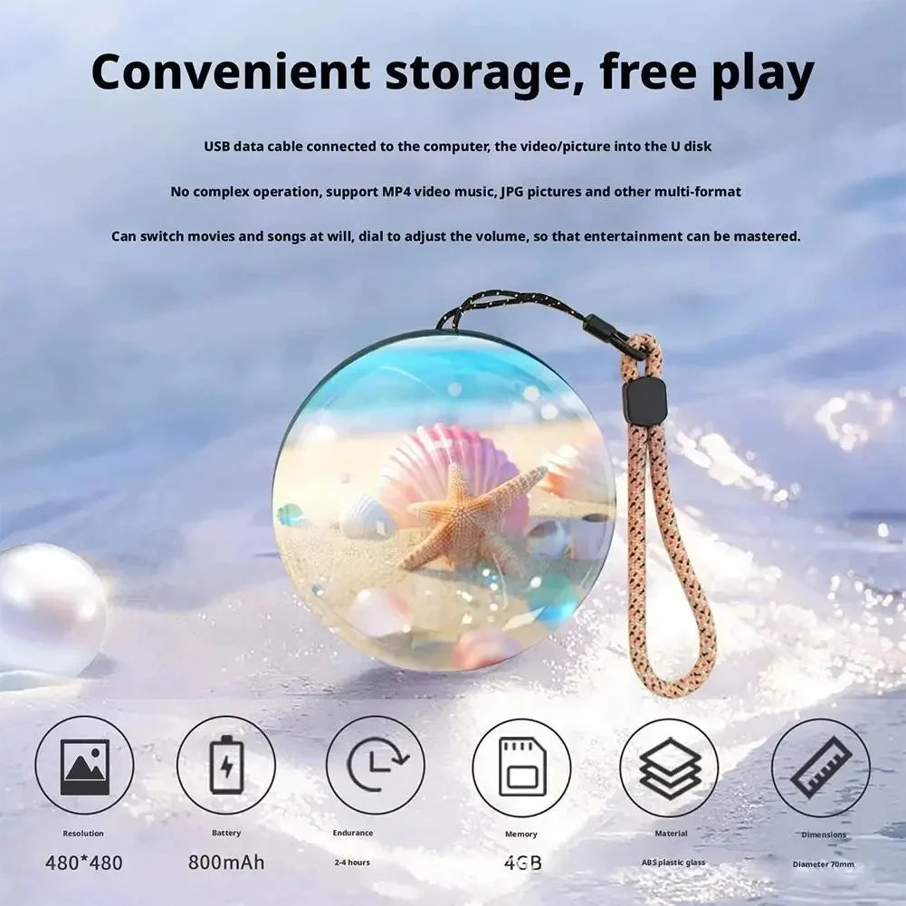 Glowing mini round screen video player with starfish design on a snowy background, featuring text about USB data cable and entertainment features.