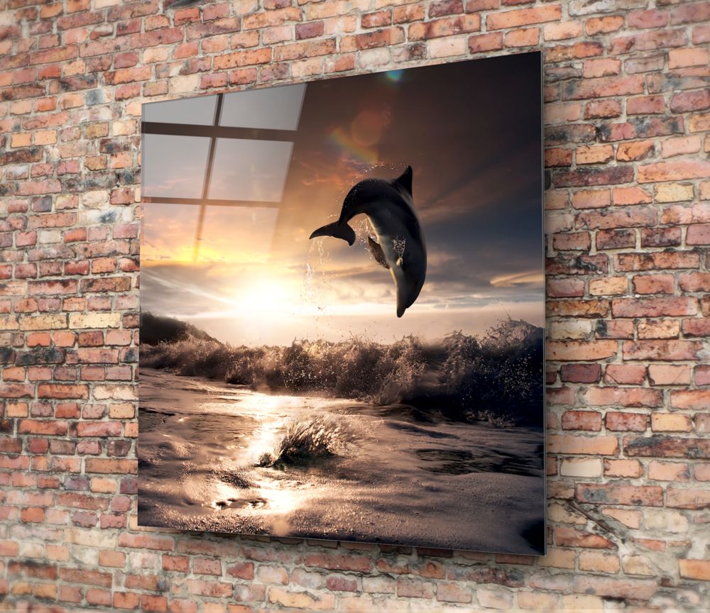 Leaping dolphin sepia surf glass wall art hung on a red brick wall