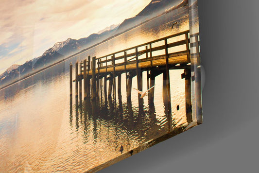 Close-up of the glossy tempered glass edge on the lake dock sunset glass wall art