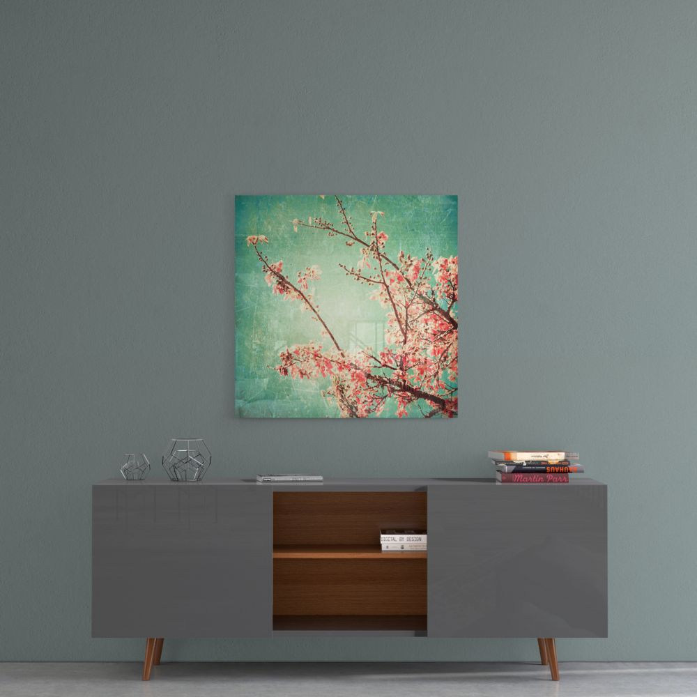Cherry blossom square glass wall art on a gray wall above a gray sideboard