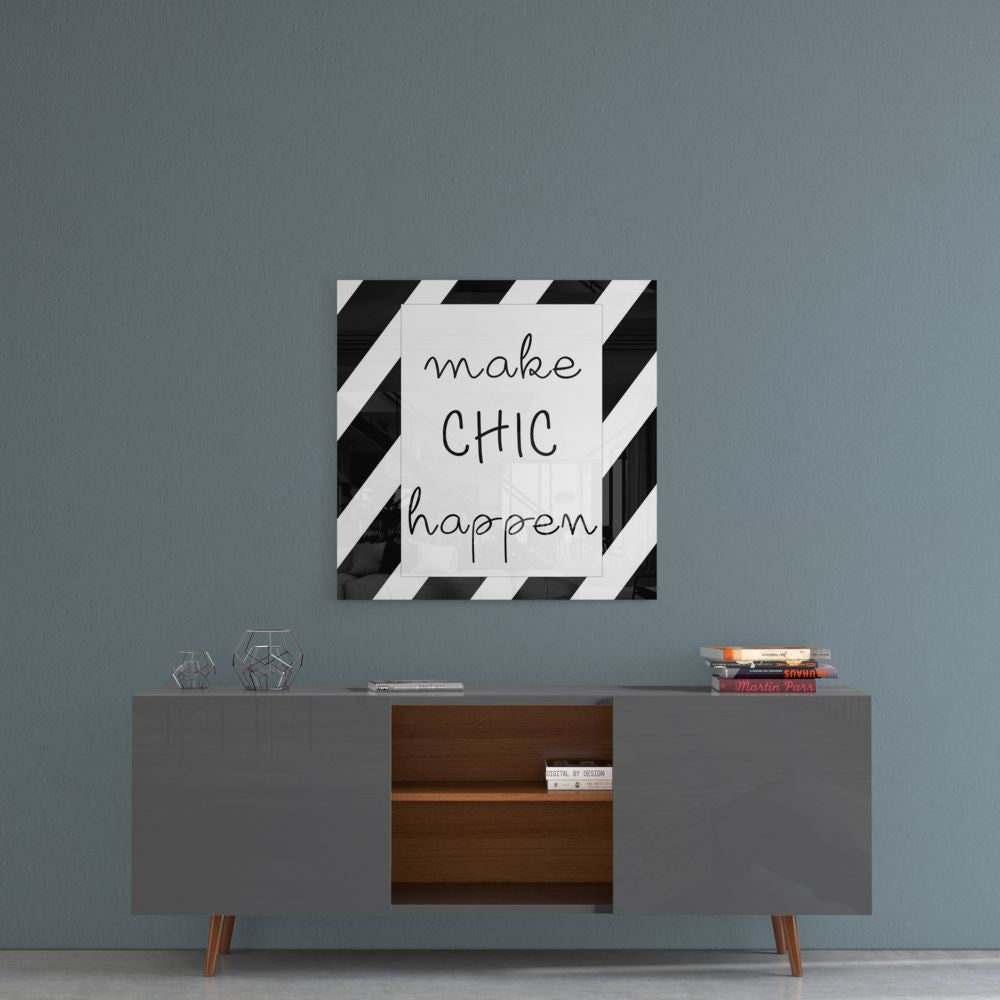 Make chic happen striped glass wall art on a blue-gray wall above a gray sideboard