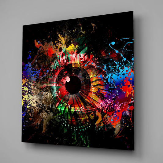 Color burst eye glass wall art on a gray wall, light reflecting off the glossy front