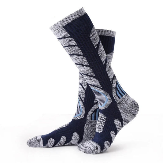 Mid length ski socks in navy and gray designed for skiing and winter hiking