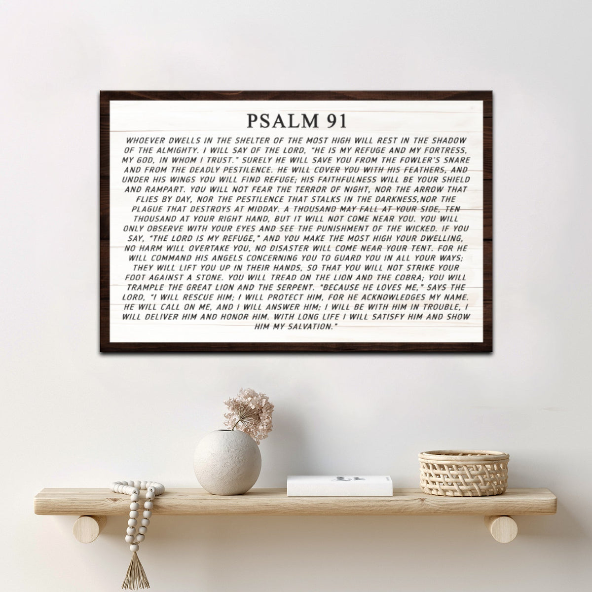 White plank-look canvas sign with the full text of Psalm 91 and a solid dark wood-look border above a wood shelf, style 2