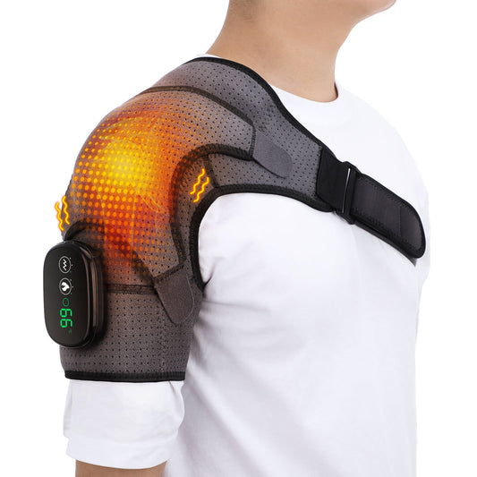 Person wearing grey heated shoulder brace with vibration massage and warming therapy