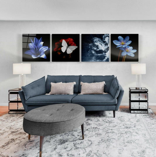 Dark floral glass panels in a single row above a blue sofa, two mirrored nightstands and an oval ottoman