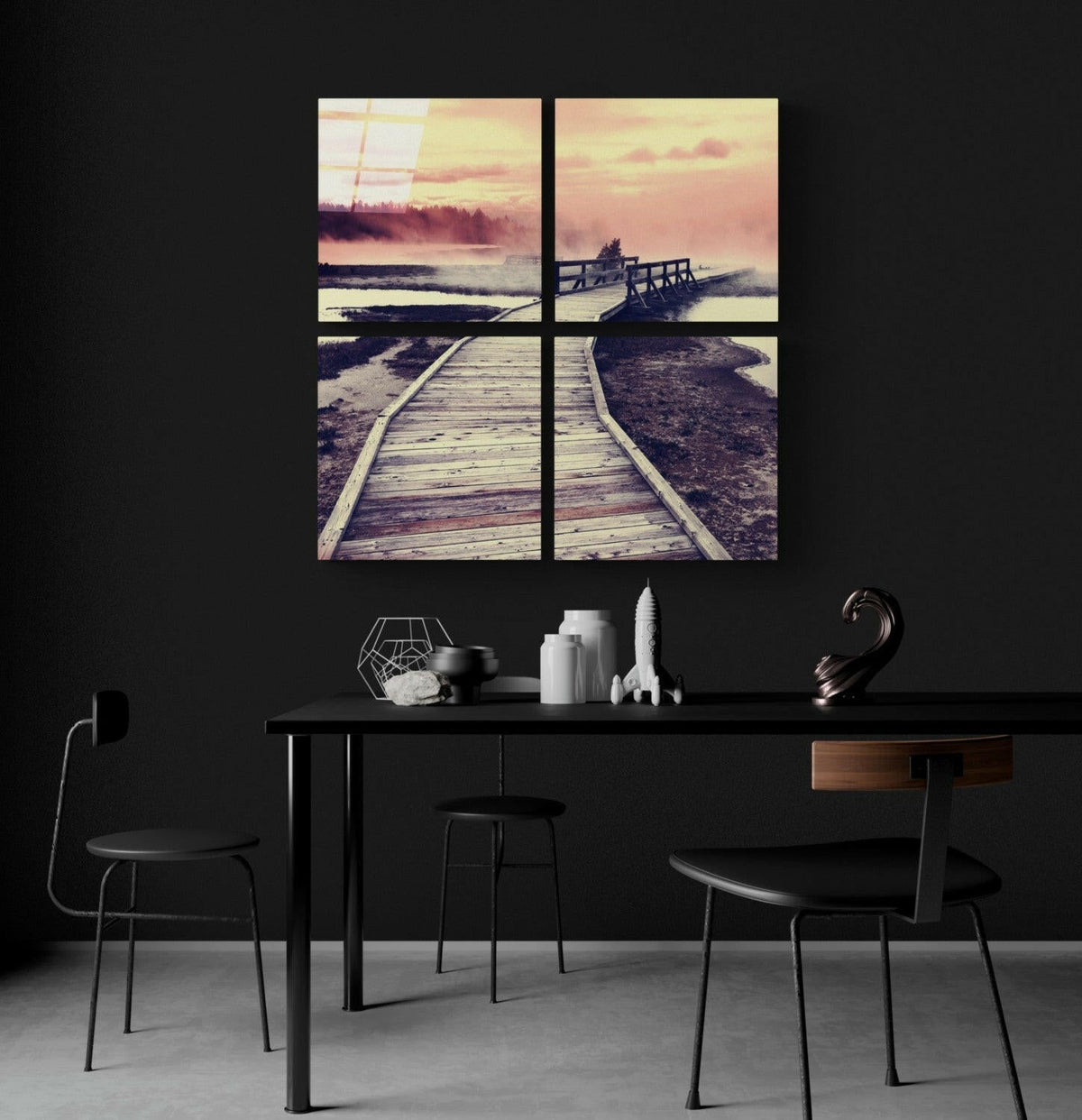 Misty pier four-panel glass set on a black wall above a black dining table with white decor
