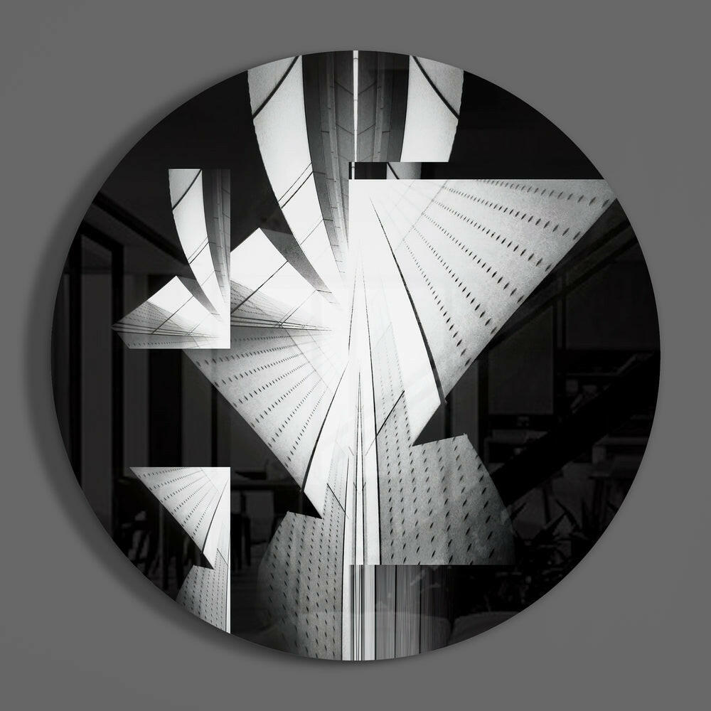 Black and white skyscraper round glass wall art on a plain gray wall