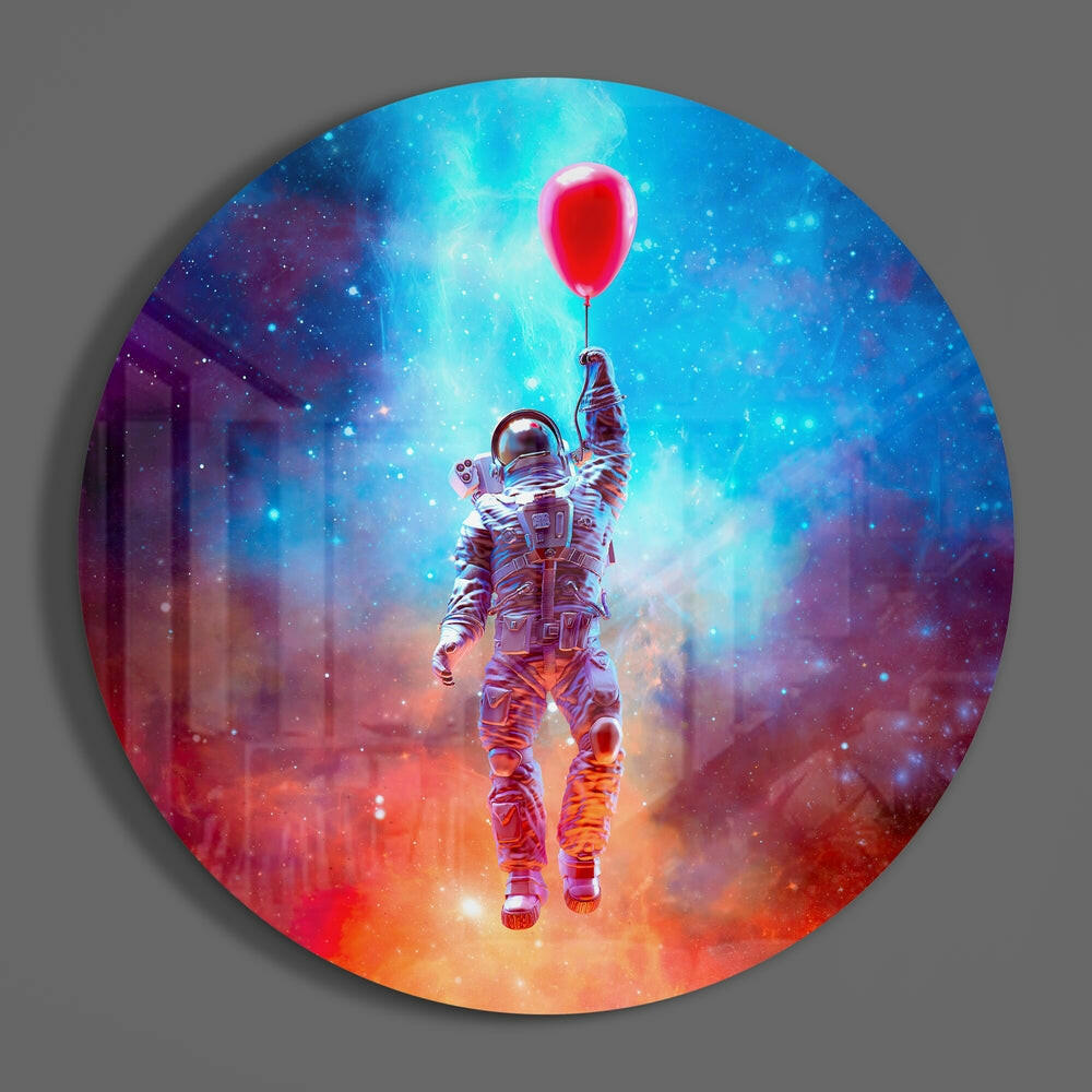 Astronaut and red balloon circle of glass on a plain gray wall