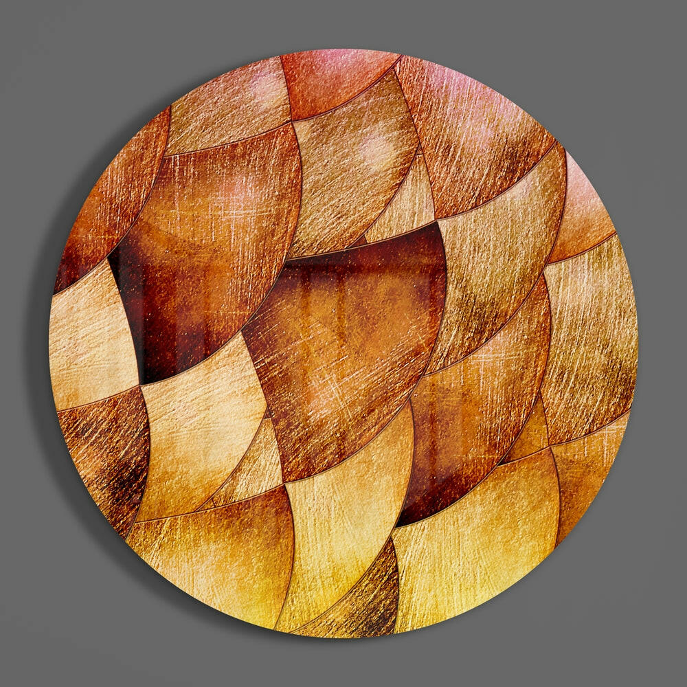 Bronze petal scales round glass disc casting a soft shadow on a gray wall