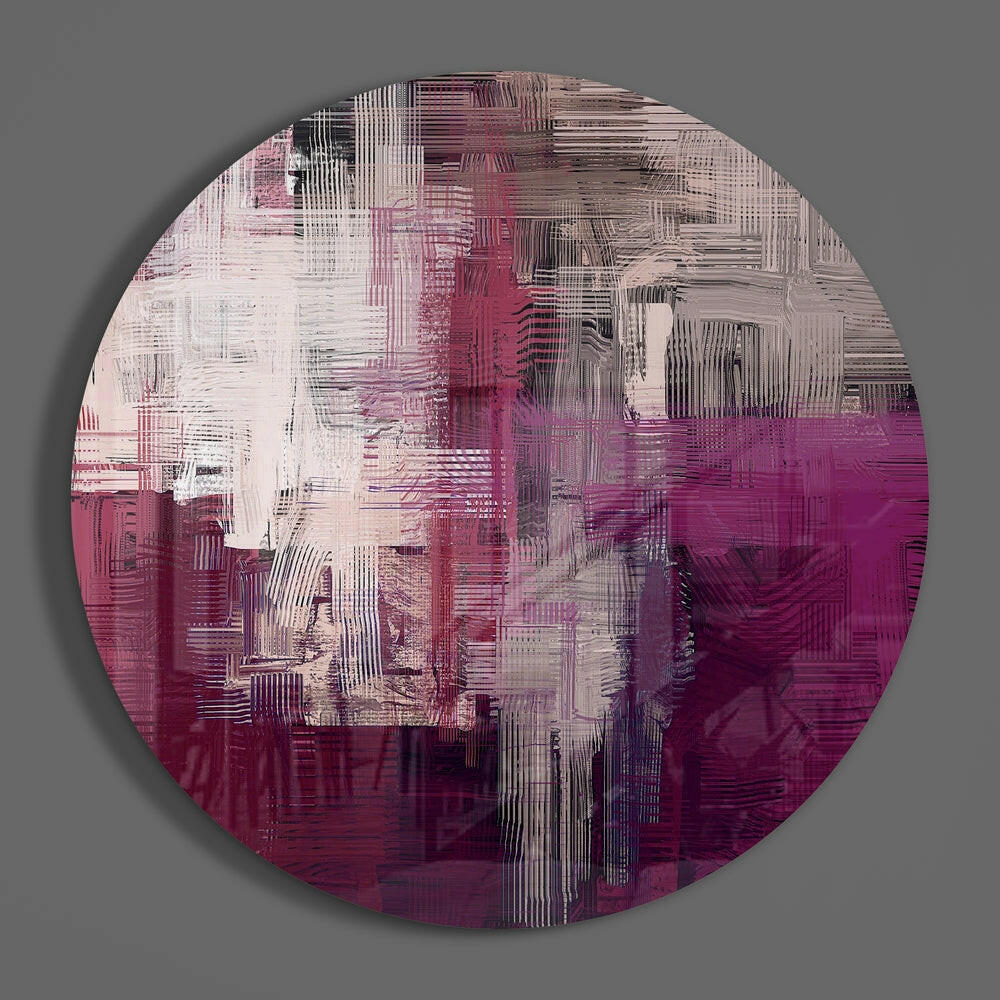 Magenta crosshatch abstract round glass wall art on a plain gray wall, glossy glass disc seen from the front