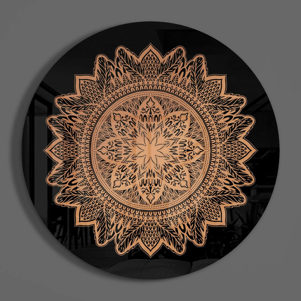 Copper mandala round glass wall art hanging on a plain gray wall