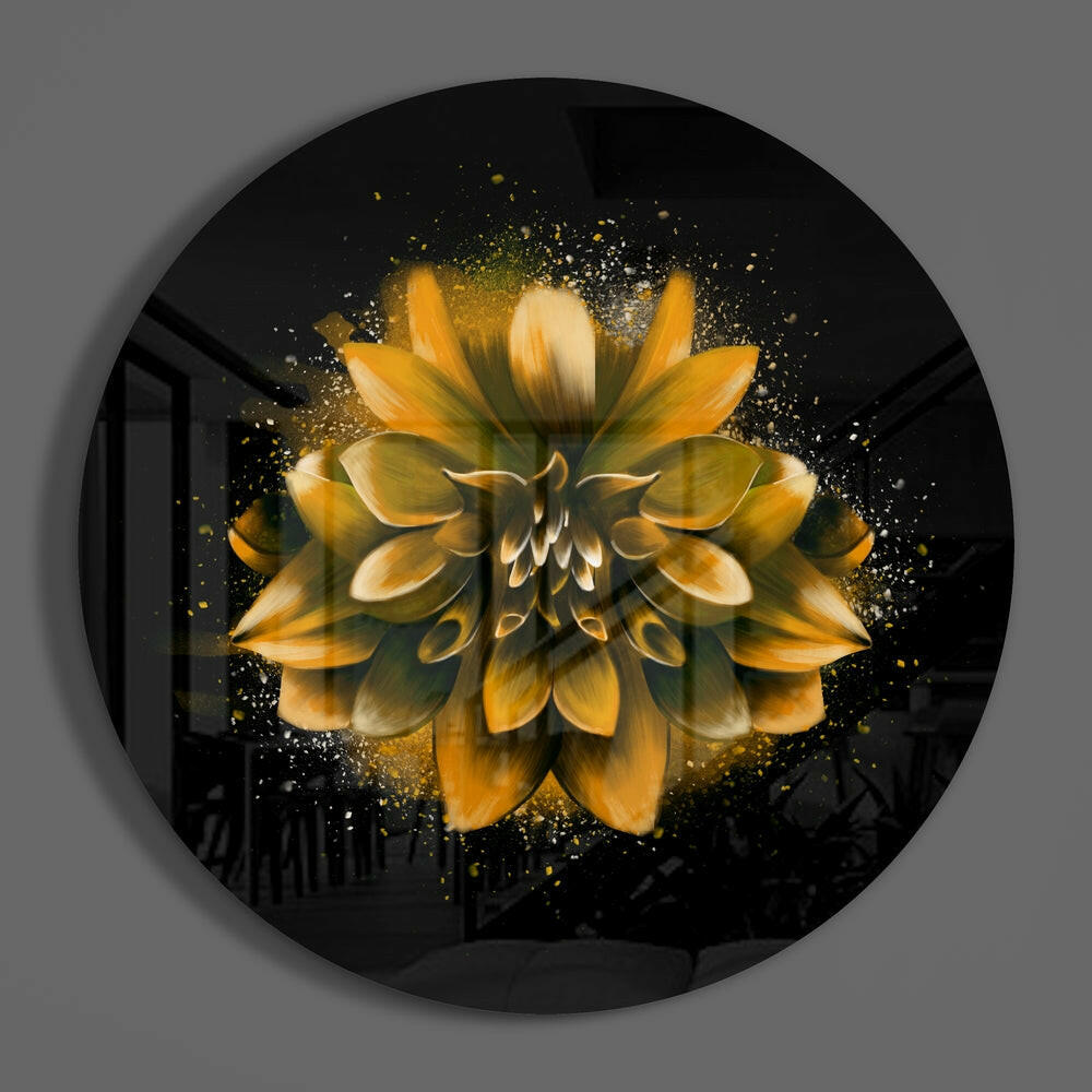Golden splatter dahlia round glass disc casting a soft shadow on a gray wall