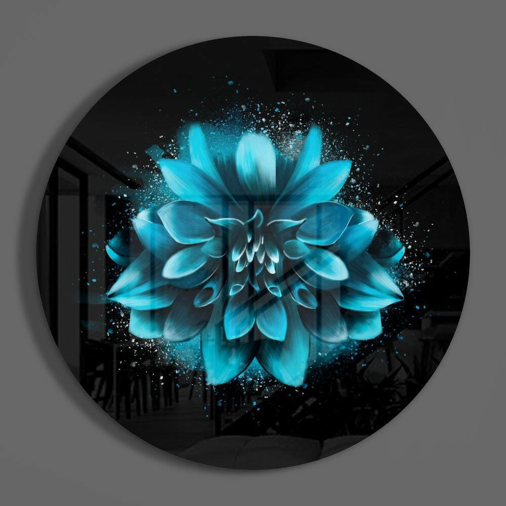 Turquoise dahlia on black round glass wall art hanging on a plain gray wall
