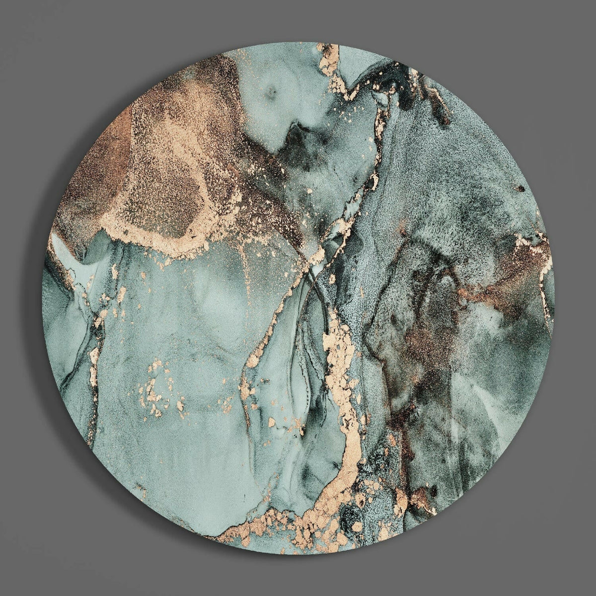 Turquoise and copper marble round glass wall art hanging on a plain gray wall