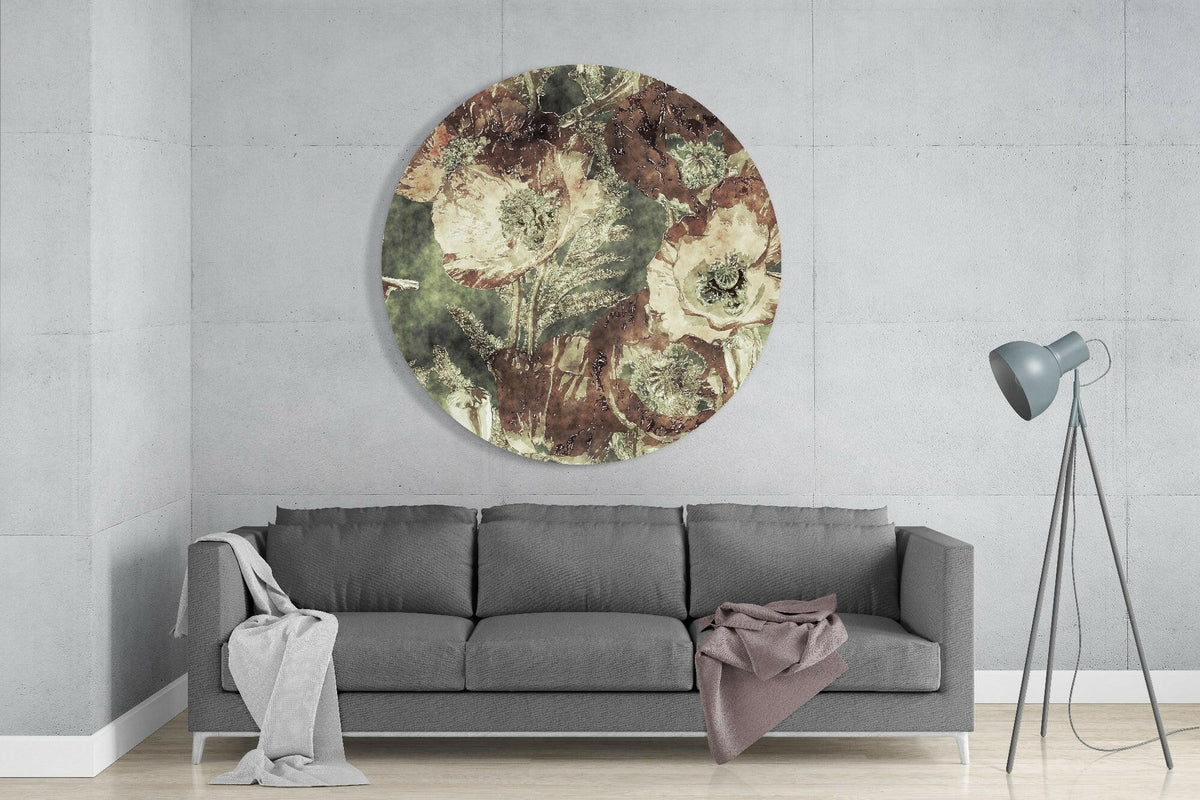 Vintage poppies round glass wall art above a gray sofa with a pink throw and a floor lamp