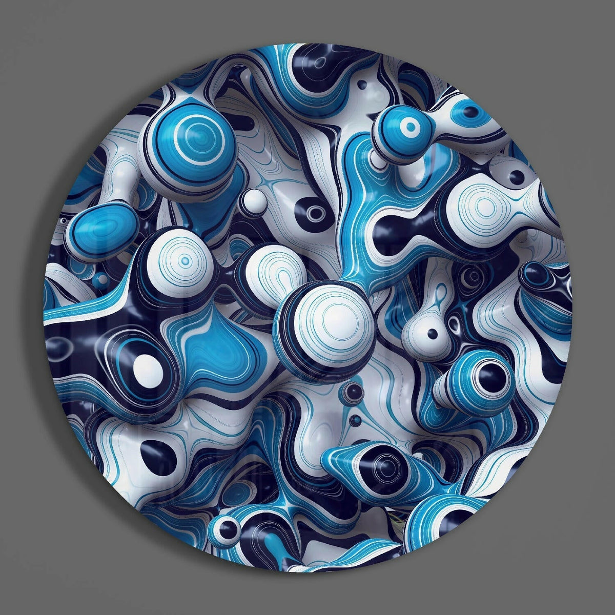 Blue fluid bubbles round glass wall art hanging on a plain gray wall