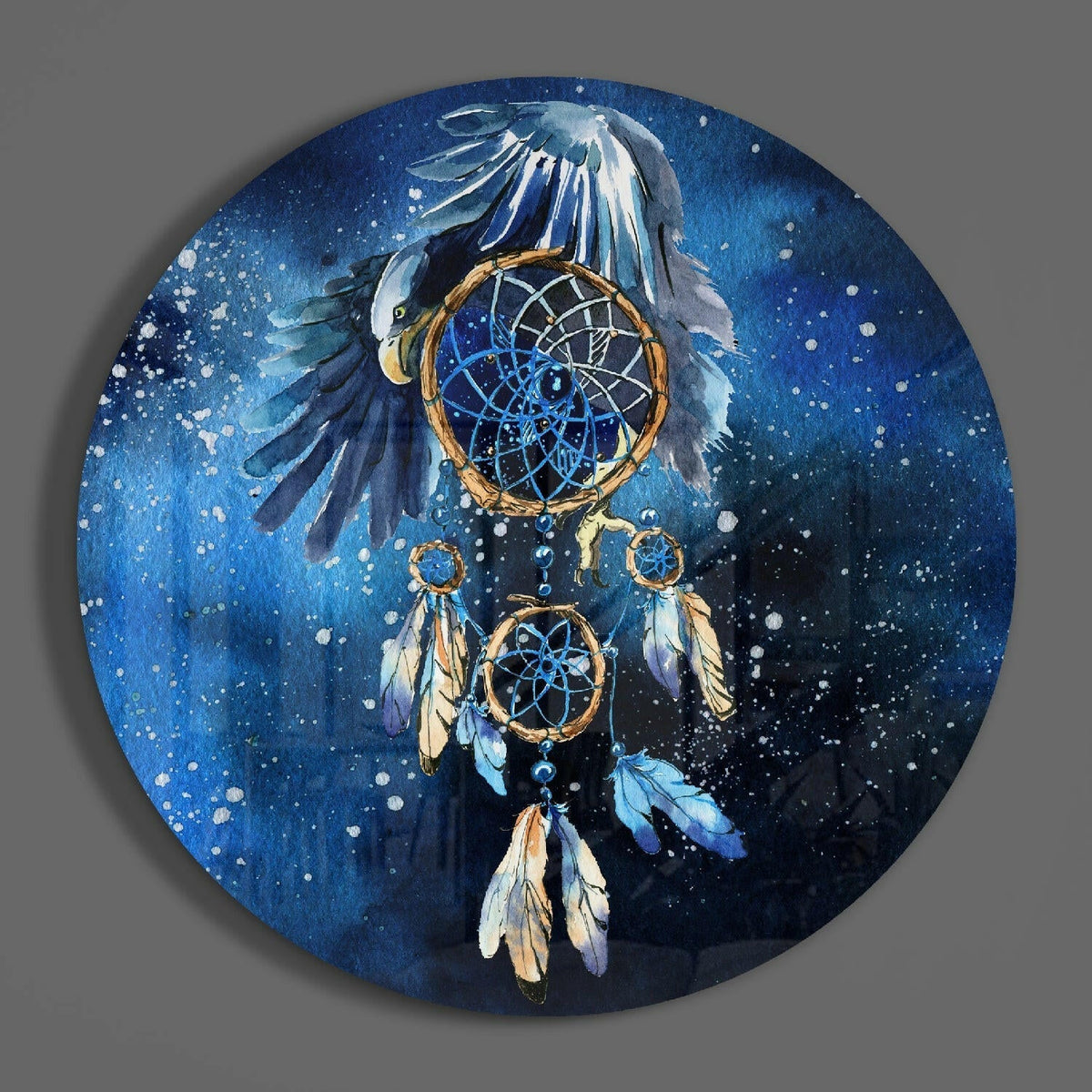 Eagle dreamcatcher round glass wall art hanging on a plain gray wall