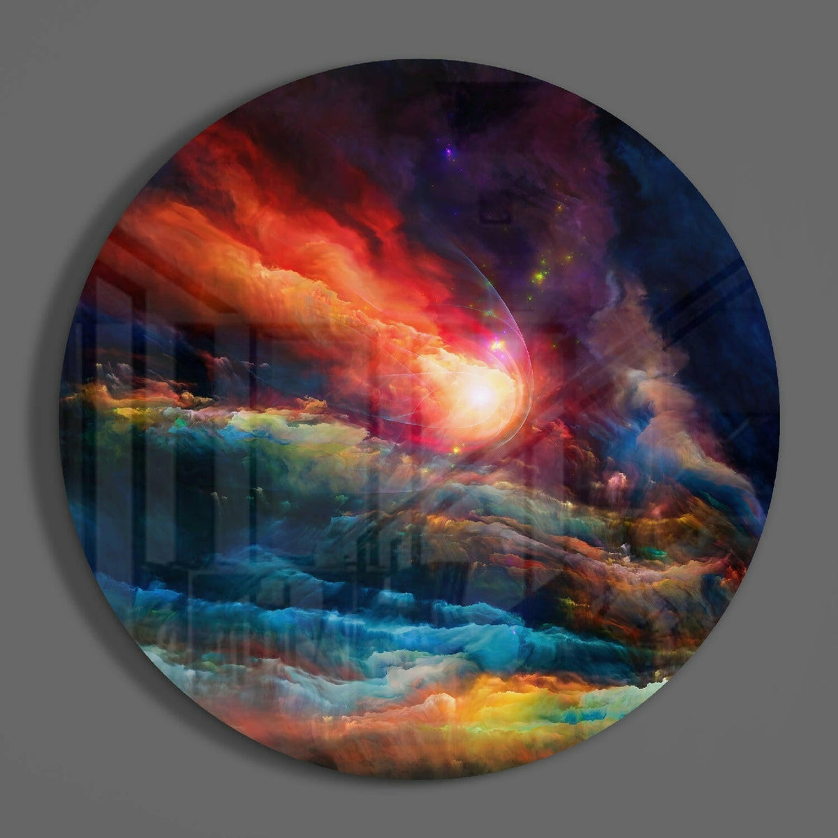 Fiery nebula burst round glass wall art on a plain gray wall, glossy glass disc seen from the front