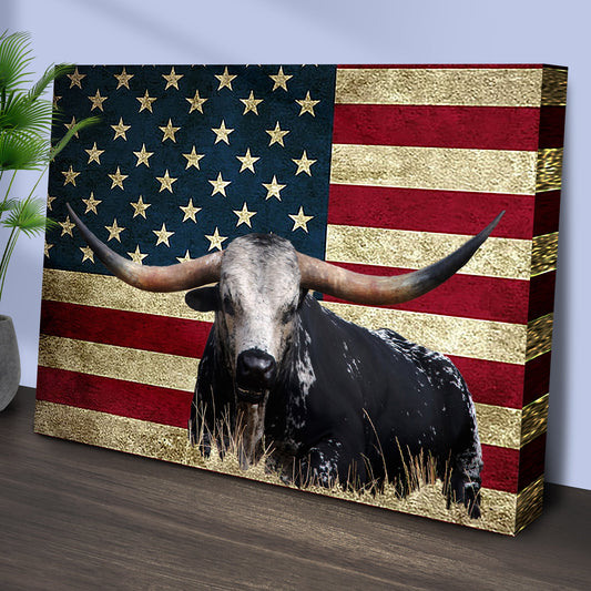Angled view of the longhorn steer and American flag canvas leaning against a pale wall