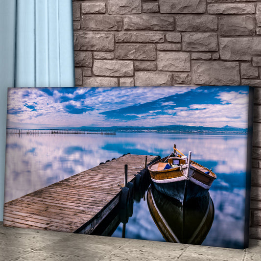 Wooden Boat at a Dock canvas shown at an angle, close view of the wrapped edge, view 2