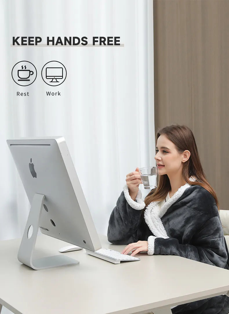Woman working from home wearing wearable electric heating blanket