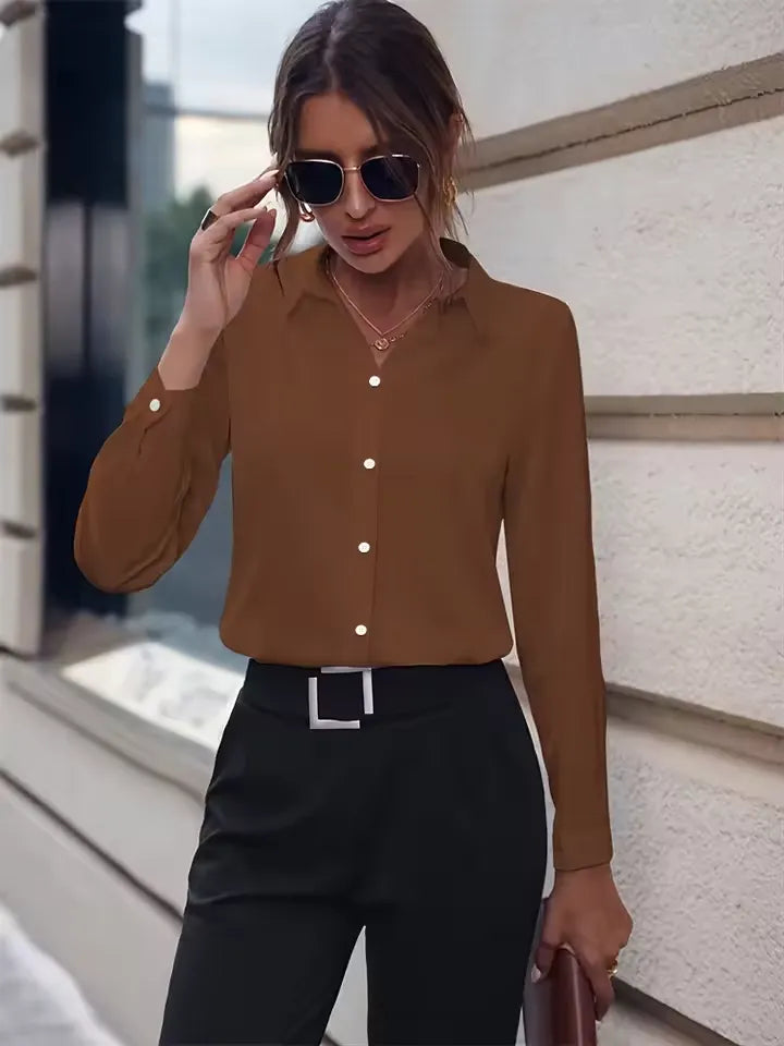 Women’s coffee brown commuter blouse paired with sleek trousers