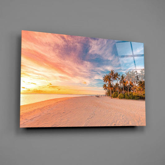 Palm beach sunset glass wall art on a gray wall, light reflecting off the glossy front