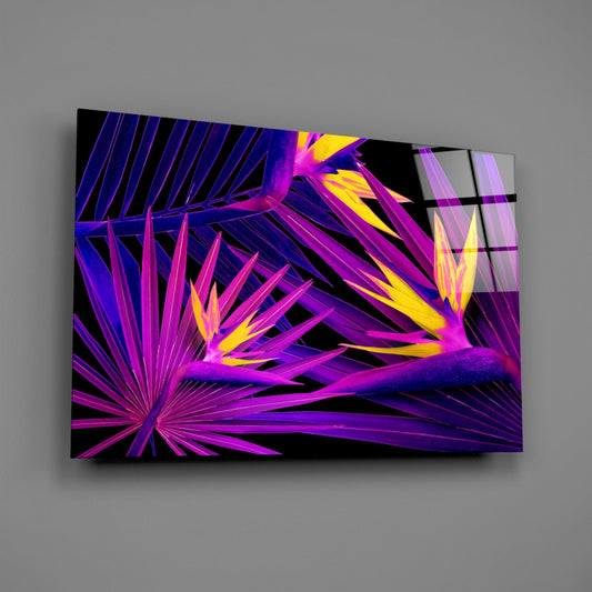 Bird of paradise glass wall art on a gray wall, light reflecting off the glossy front