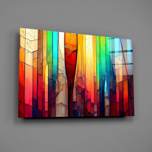 Cracked rainbow mosaic glass wall art on a gray wall, light reflecting off the glossy front