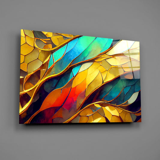 Colorful mosaic leaves glass wall art on a gray wall, light reflecting off the glossy front