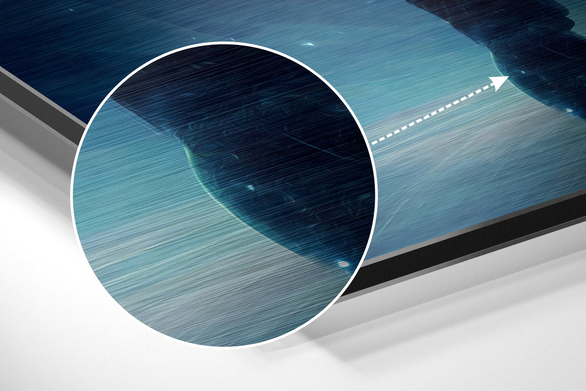 Magnified detail of the brushed metal grain showing through the blue cosmic man from behind print