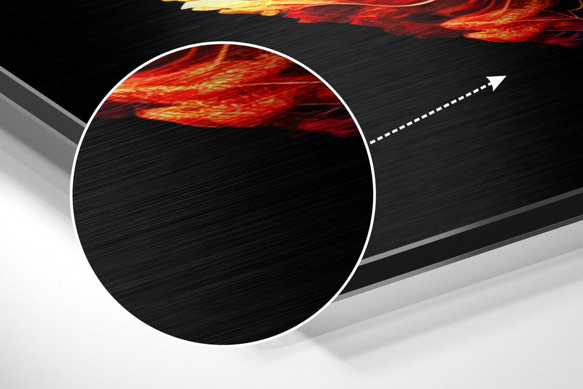 Magnified detail of the brushed metal grain showing through the fiery multicolor leaf print