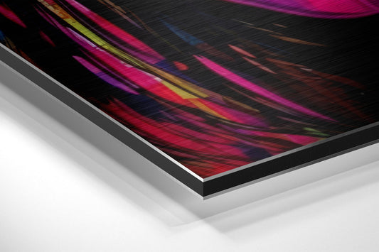Newsprint drip face brushed aluminum panel corner close-up showing the brushed metal grain