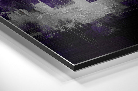 Purple haze city skyline brushed aluminum panel corner close-up showing the brushed metal grain