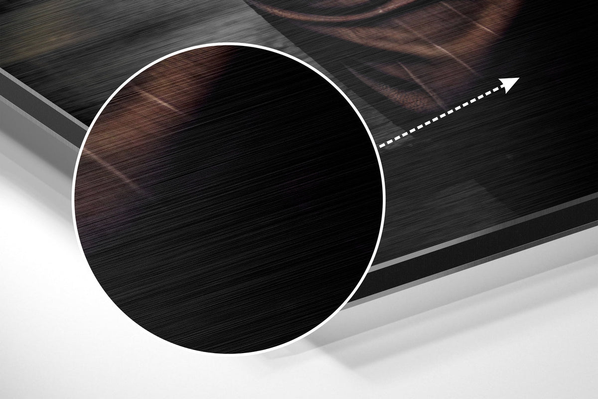 Magnified detail of the brushed metal grain showing through the bulldog inspector in vest print