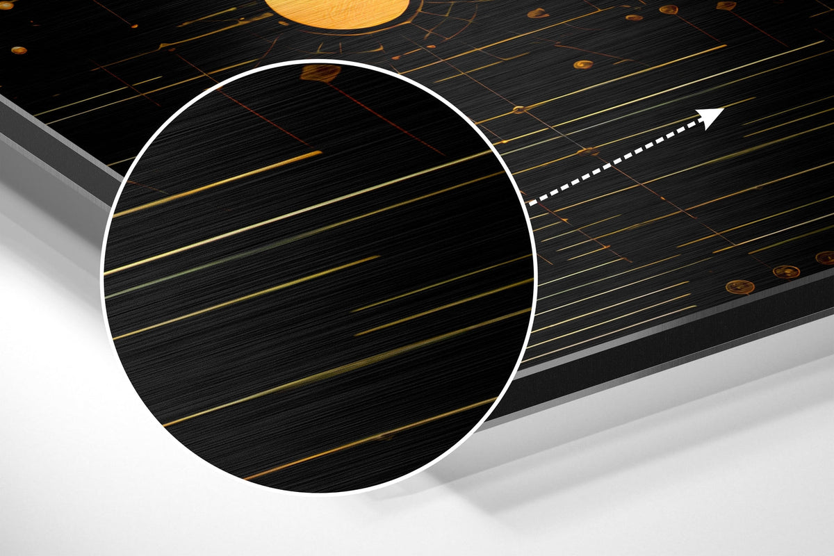 Magnified detail of the brushed metal grain showing through the black and gold circles print