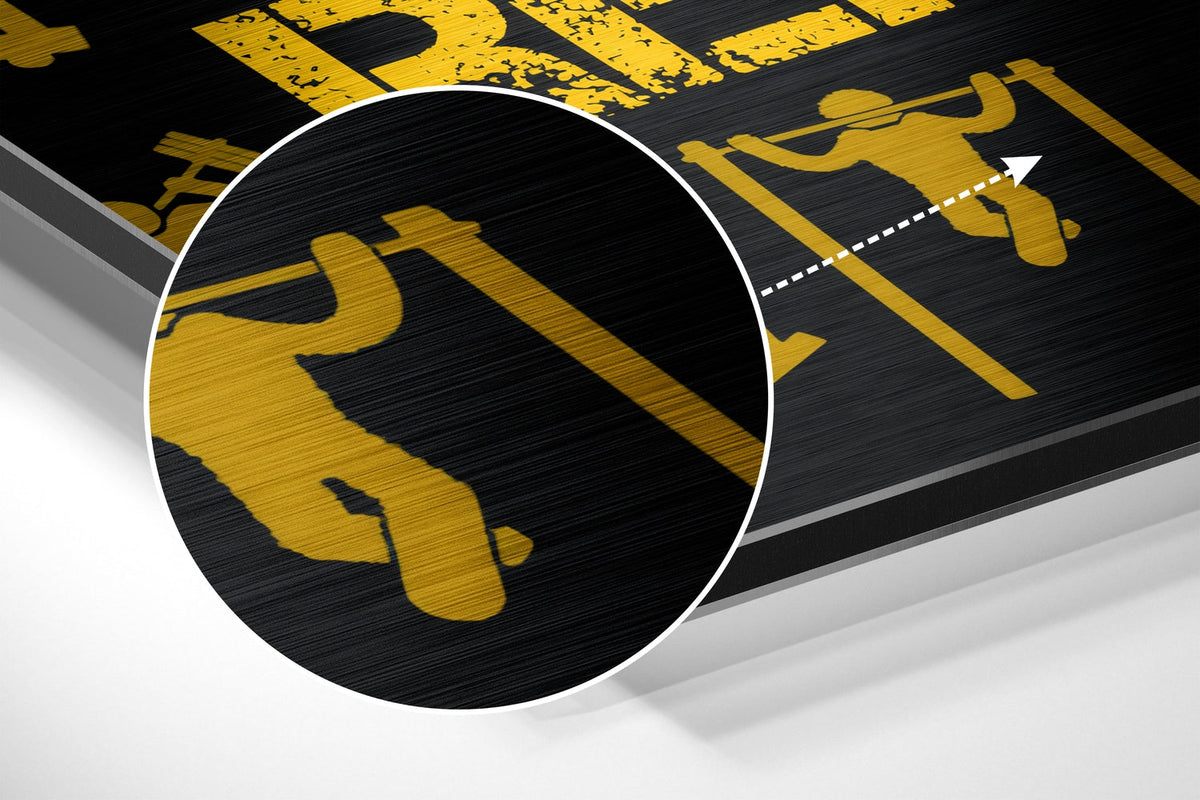 Magnified detail of the brushed metal grain showing through the gold gym icons print